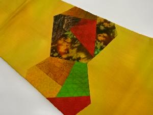 切り嵌め抽象に古典柄模様織出し名古屋帯